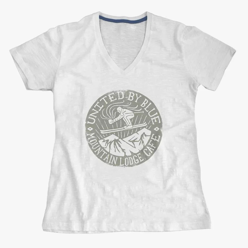 White V-neck T-shirt with 'United by Blue Mountain Lodge Cafe' graphic featuring skier and mountains